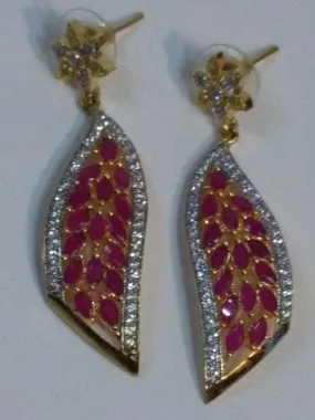 Wing-shaped earrings with pink semi-precious stones